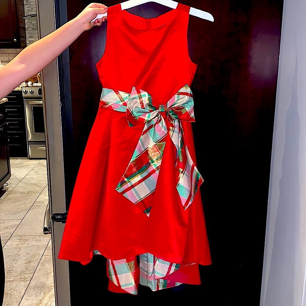 Red formal girls dress with plaid sash